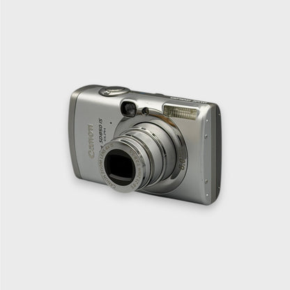Front and side view of a silver Canon PowerShot SD850 IS with its lens extended