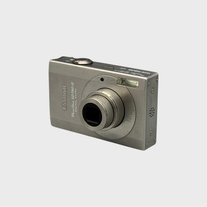 Front and side view of a silver Canon PowerShot SD790 IS with its lens extended