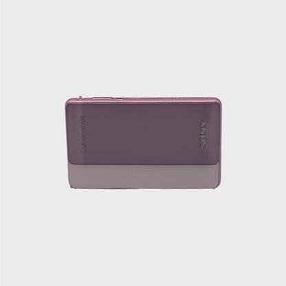 Front view of a pink Sony Cyber-shot DSC-TX5 with its sliding lens cover closed