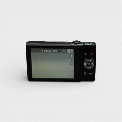 Rear view of a black Canon PowerShot ELPH 350 HS showing the illuminated LCD screen and control buttons