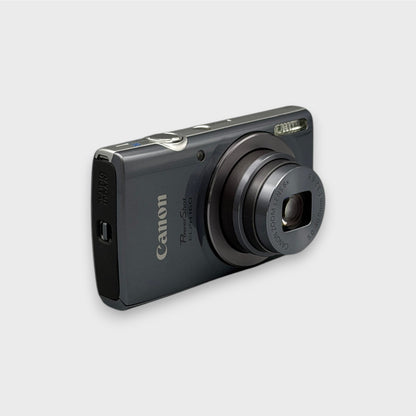 Gray Canon PowerShot ELPH 160 viewed from a front angle with its lens extended.