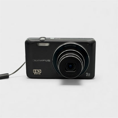 Front view of a black Olympus VG-120 with its lens extended