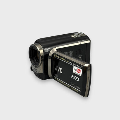 Angled front view of the JVC Everio GZ-MG680 camcorder with its flip-out screen partly open