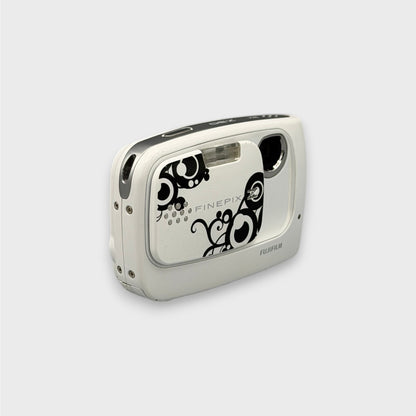 White Fujifilm FinePix Z30 with a black swirl pattern, viewed from a front angle with its lens exposed.