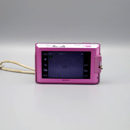 Rear view of a pink Sony Cyber-shot DSC-T90 showing its illuminated LCD touchscreen