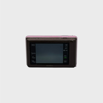 Rear view of a pink Sony Cyber-shot DSC-TX5 showing its illuminated LCD touchscreen