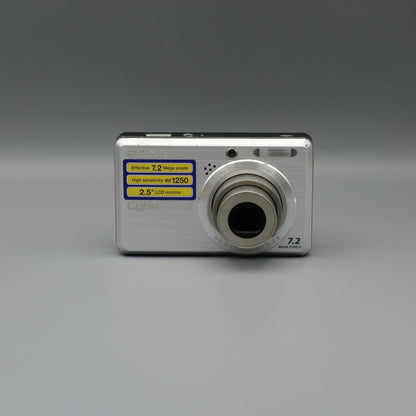 Front view of a silver Sony Cyber-shot DSC-S750 with its lens extended