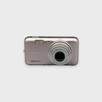 Front view of a pink Kodak EasyShare V803 digital camera with its lens extended