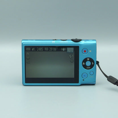 Rear view of a blue Canon PowerShot ELPH 110 HS showing the illuminated LCD screen and control buttons