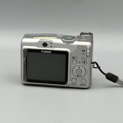 Rear view of a silver Canon PowerShot A700 showing the LCD screen, viewfinder and control buttons