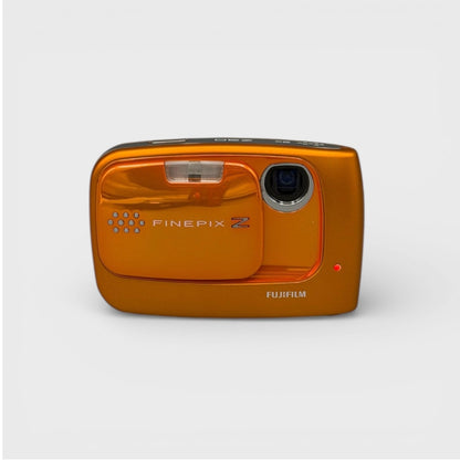 Orange Fujifilm FinePix Z30 front view with its sliding cover open and lens exposed.