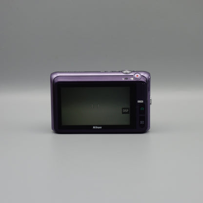 Purple Nikon Coolpix S6400 rear view showing the LCD screen and rear buttons.