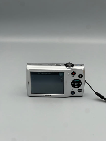 Rear view of a silver Canon PowerShot A2500 showing its LCD screen and circular control pad