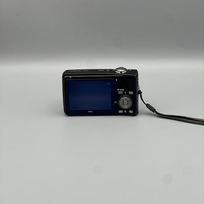 Rear view of a black Nikon Coolpix S630 showing the illuminated LCD screen and control buttons