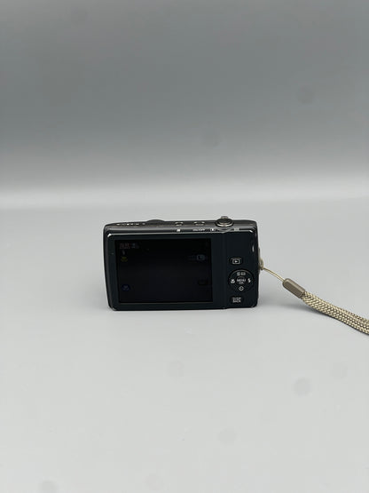 Rear view of a silver Fujifilm FinePix T550 showing the LCD screen and control buttons