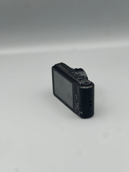 Rear and side view of a black Sony Cyber-shot DSC-H70 showing the screen and top controls