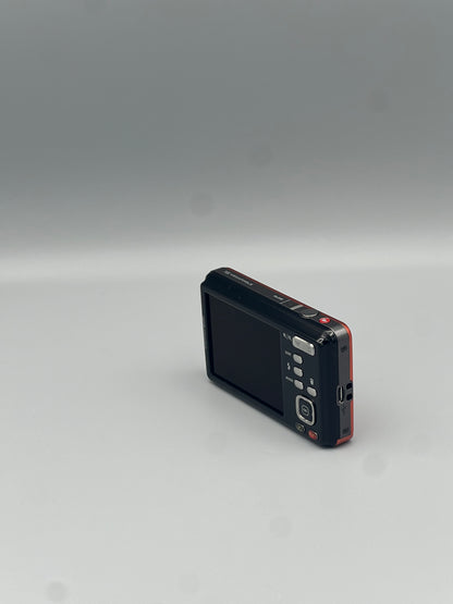 Angled rear view of an orange Kodak EasyShare M5350 showing the LCD screen and control panel