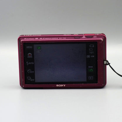 Rear view of a pink Sony Cyber-shot DSC-TX9 showing its illuminated LCD touchscreen