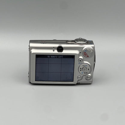 Canon PowerShot SD550 rear view showing the LCD screen, viewfinder and control buttons.