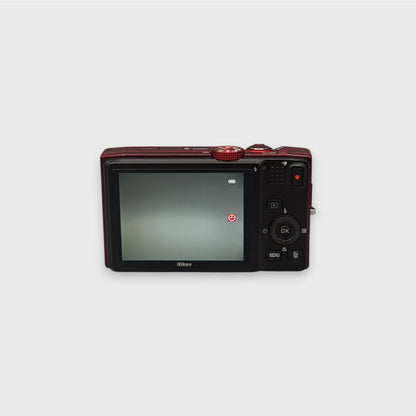 Nikon Coolpix S8200 rear view showing the LCD screen, control dial and buttons.