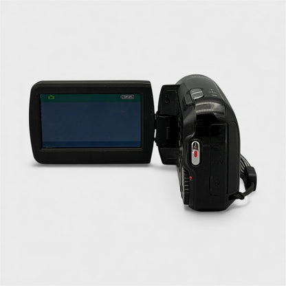 Rear view of the Panasonic SDR-S7P camcorder with its flip-out display lit and record button visible