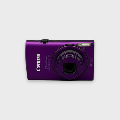 Front view of a purple Canon PowerShot ELPH 310 HS digital camera with its lens extended