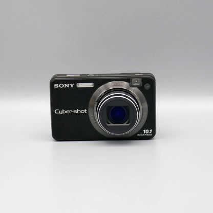 Front view of a black Sony Cyber-shot DSC-W170 with its lens extended