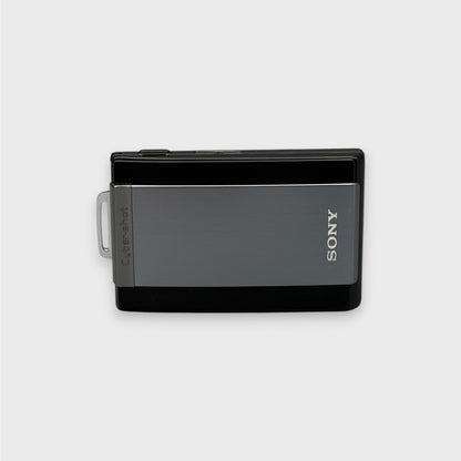 Front view of a gray and black Sony Cyber-shot DSC-T300 with its sliding lens cover closed