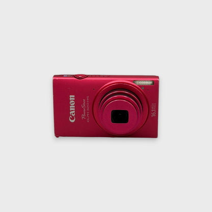 Front view of a pink Canon PowerShot ELPH 320 HS digital camera with its lens extended