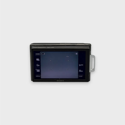 Rear view of a gray and black Sony Cyber-shot DSC-T300 showing its illuminated LCD touchscreen