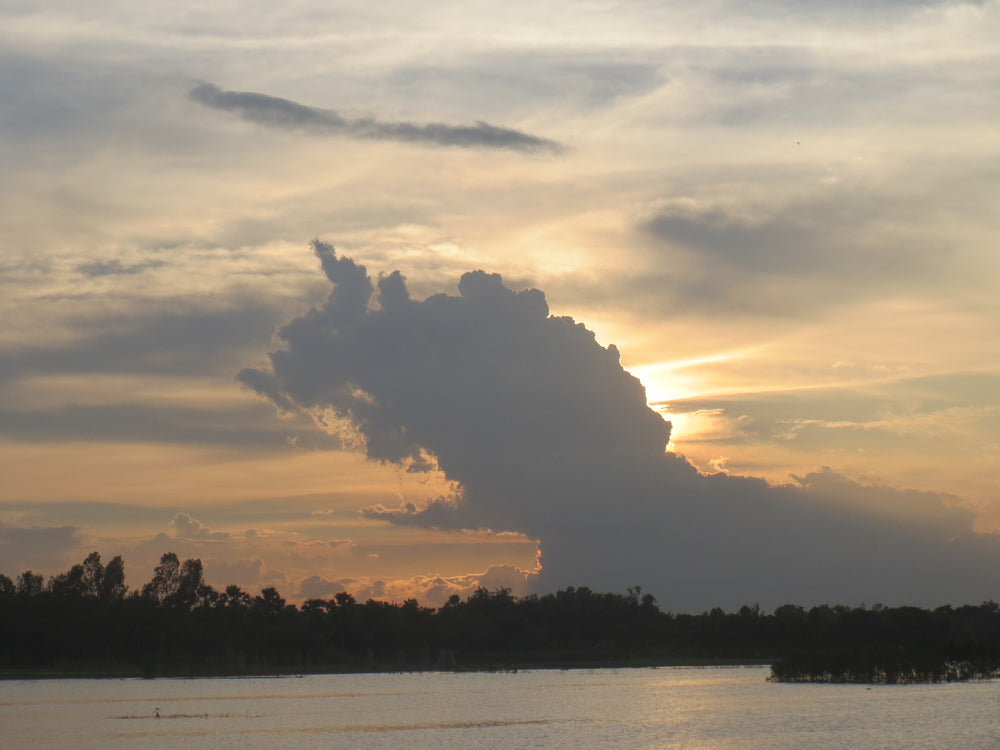 Golden clouds over the river