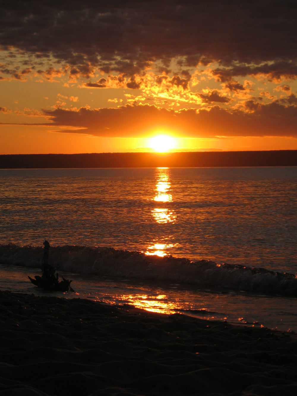 Golden Lake Superior sunset and small waves